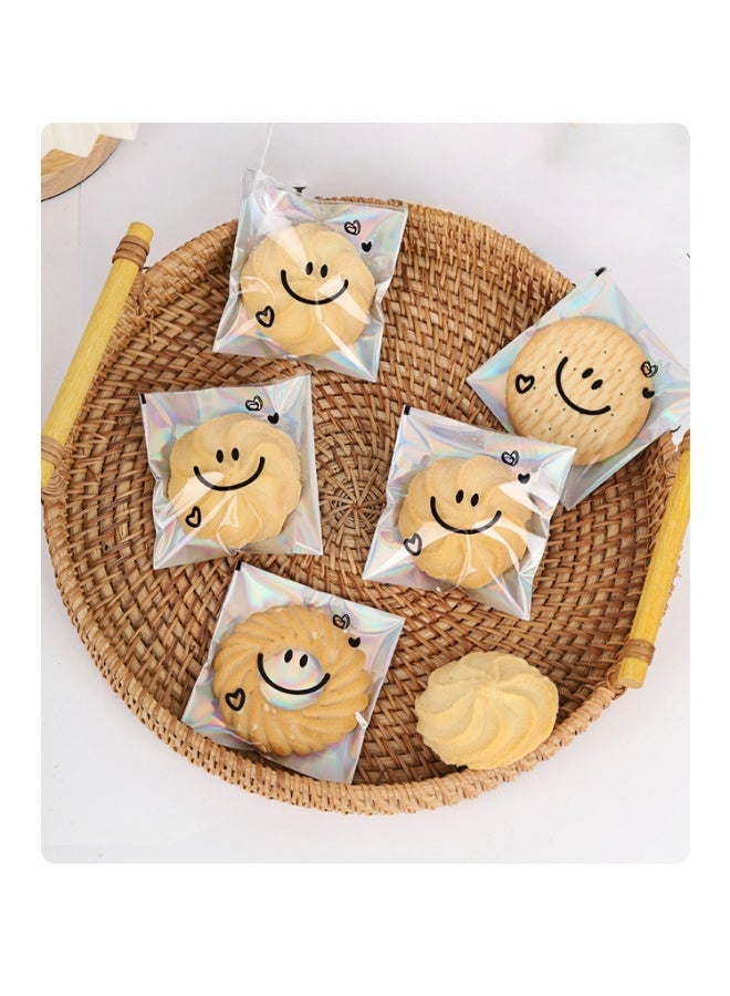 RTYY 100 كيس لاصق ذاتي للبسكويت، أكياس سيلوفان قابلة لإعادة الإغلاق، أكياس بلاستيكية مزينة بتعبيرات لطيفة لخبز البسكويت والحلوى، أكياس بلاستيكية شفافة للحلويات، أكياس تغليف فردية للحلوى، أكياس سيلوفان لتوزيعات الحفلات، لتغليف البسكويت والشوكولاتة والوجبات الخفيفة والمخبوزات (10 × 10 سم). - Image 4